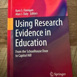 LOVINGLY USED USING RESEARCH EVIDENCE IN EDUCATION: FROM THE SCHOOLHOUSE DOOR
